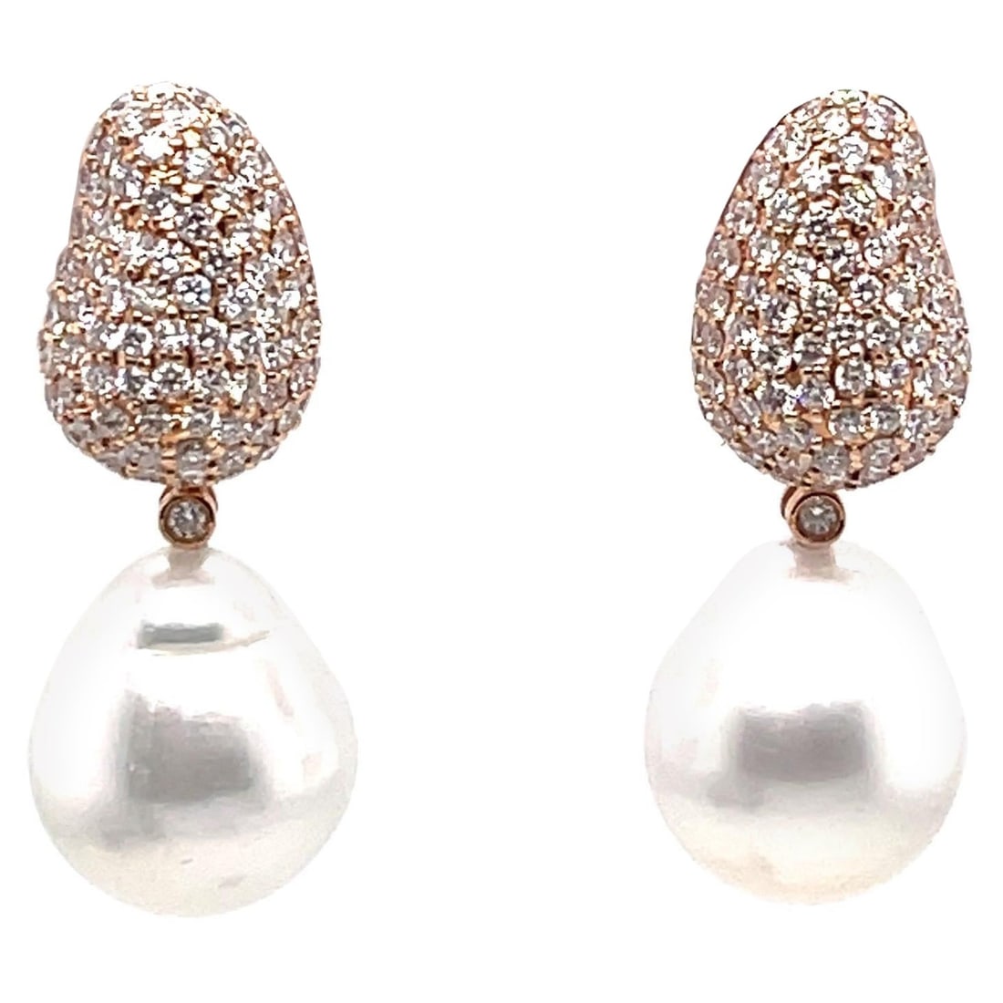18K Rose Gold Detachable South Sea Pearl Diamond Earrings: 18K Rose Gold Detachable South Sea Pearl Diamond Earrings This exquisite pair of earrings features a stunning design crafted from 18k rose gold, showcasing the versatility of detachable components. Th