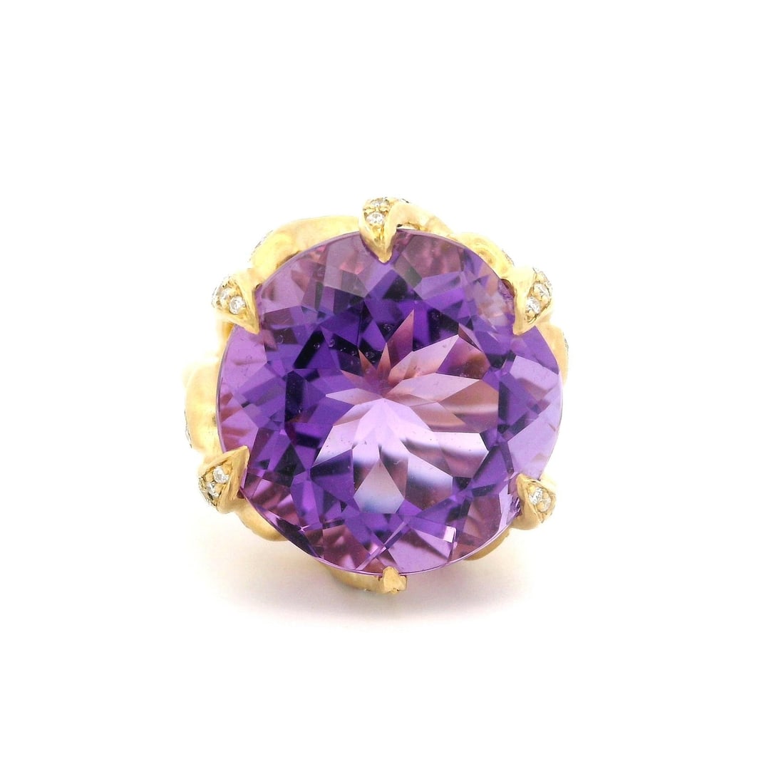 Carelle 18k Gold Amethyst Diamond Leaf Cocktail Ring 15.4ctw: Carelle 18k Gold Amethyst Diamond Leaf Cocktail Ring 15.4ctw This exquisite Carelle cocktail ring features a stunning 15.4ctw natural amethyst at its center, beautifully complemented by 42 pave-set di