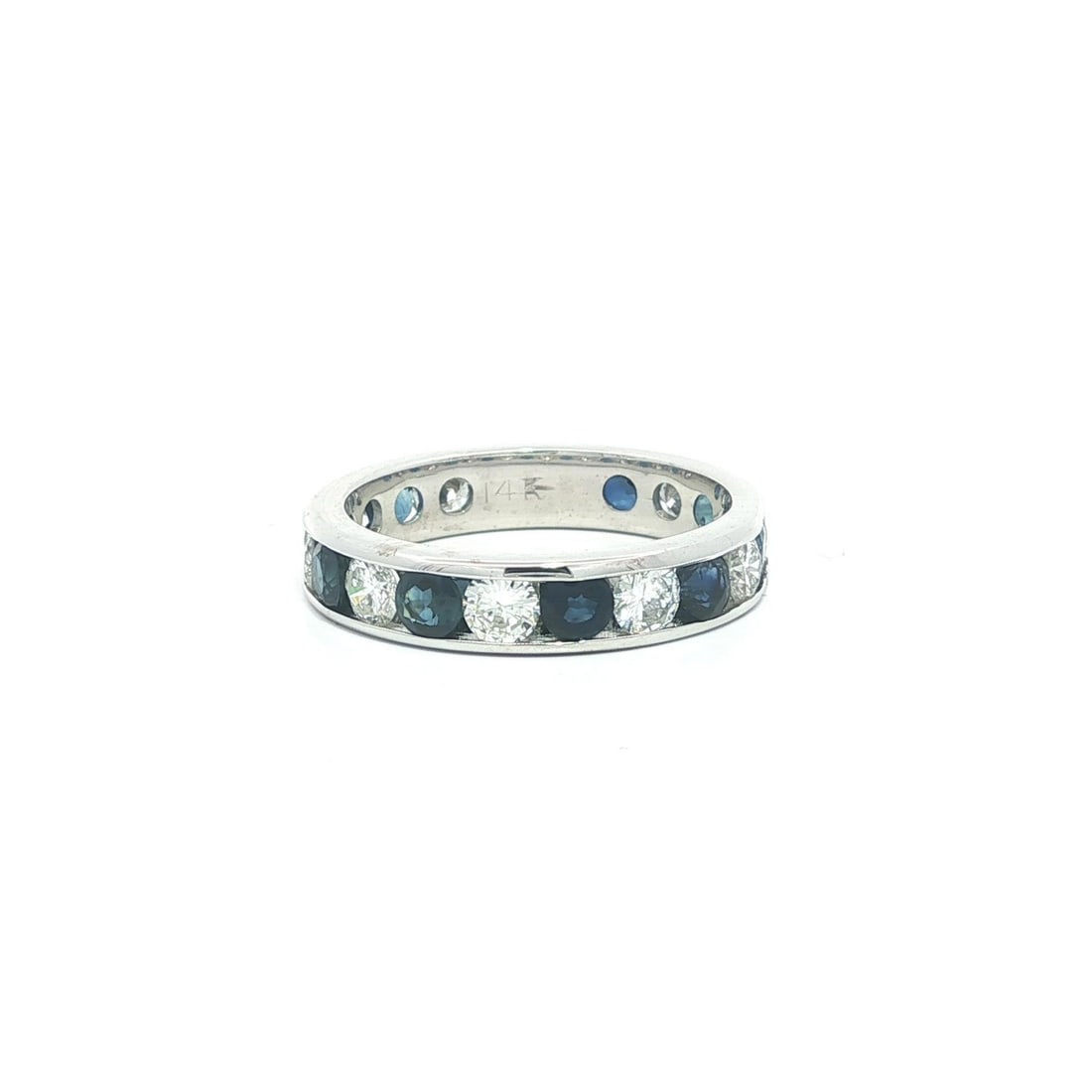 Sapphire and Diamond Eternity Band in 14k White Gold Size 6: Sapphire and Diamond Eternity Band in 14k White Gold Size 6 This elegant eternity band ring features nine natural round brilliant cut sapphires with a total weight of approximately 1.45 carats, set al