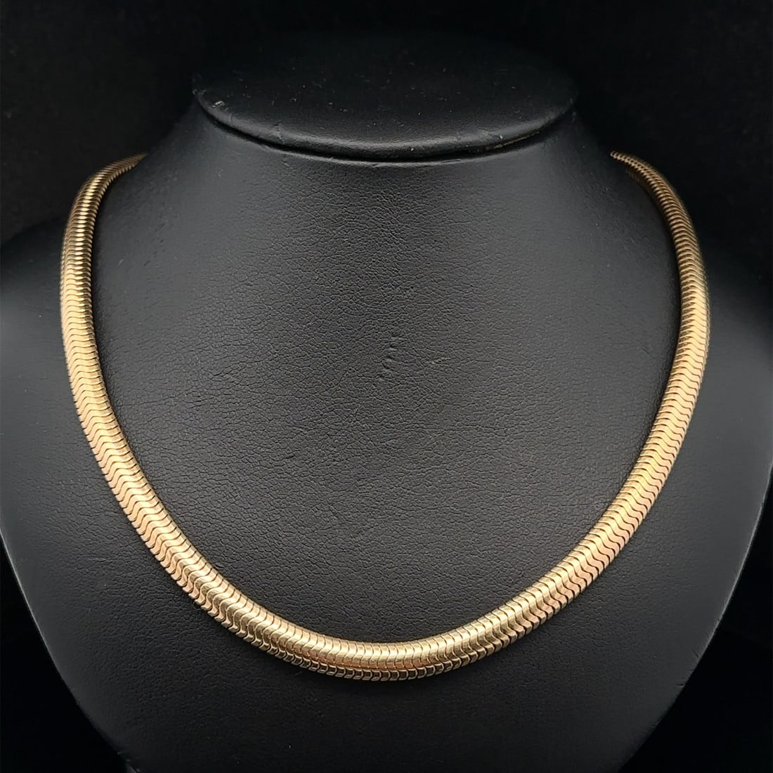 Tiffany 14k Yellow Gold Snake Chain Necklace with Buckle Clasp 15.5 Inch: Tiffany 14k Yellow Gold Snake Chain Necklace with Buckle Clasp 15.5 Inch This vintage retro Tiffany & Co. necklace is crafted from solid 14k yellow gold and features a classic snake link design. Measu