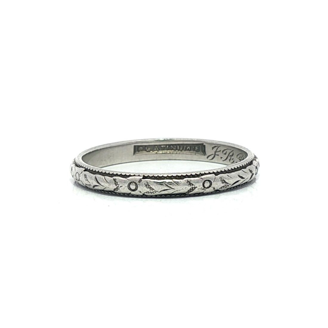 1929 Antique Art Deco Floral Engraved Platinum Eternity Band Ring 5.5: 1929 Antique Art Deco Floral Engraved Platinum Eternity Band Ring 5.5 This exquisite antique Art Deco eternity band ring, crafted in solid platinum, features a delicate floral engraving that highlight