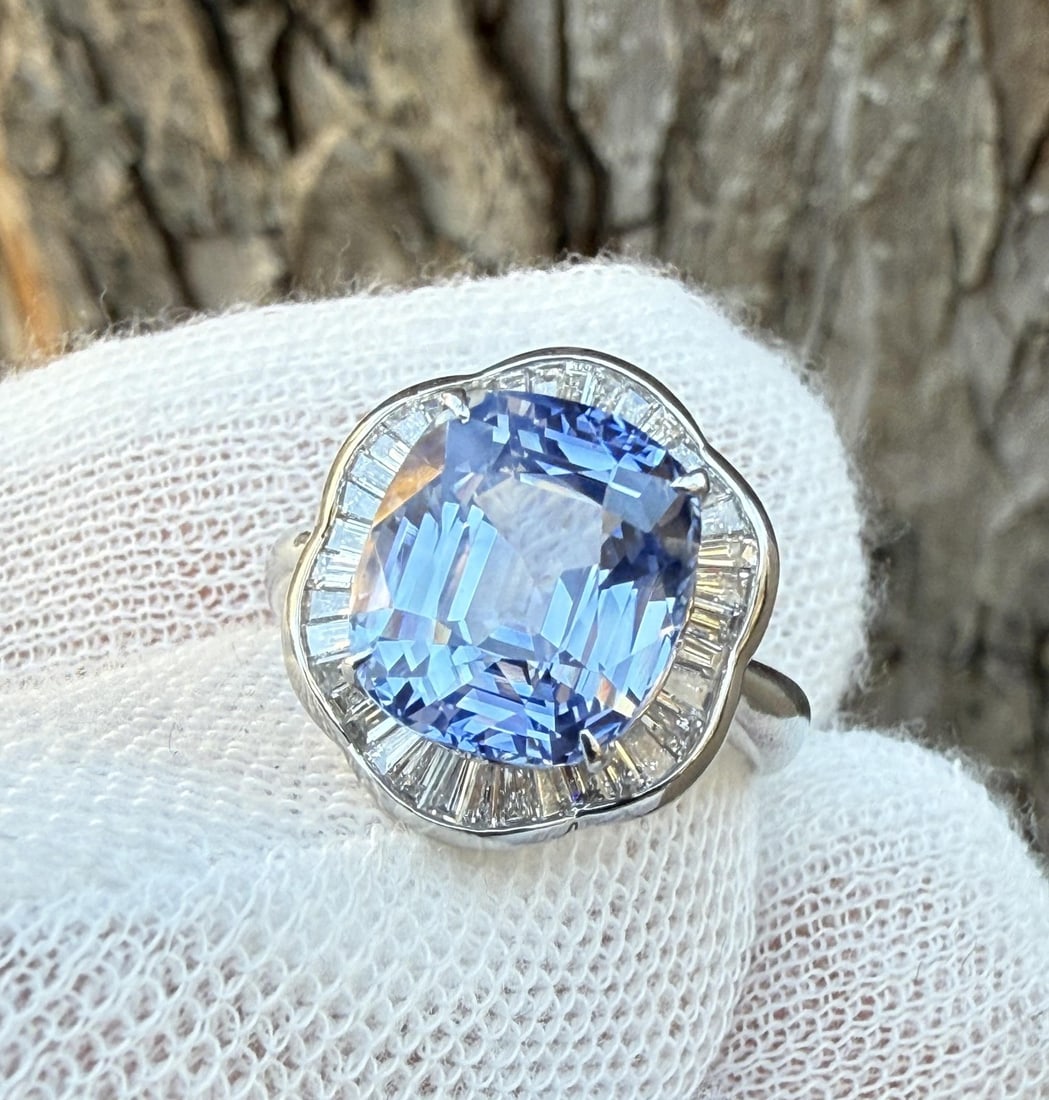 GIA Certified Platinum Ring With 6.32ct No Heat Ceylon Sapphire and Diamonds: GIA Certified Platinum Ring With 6.32ct No Heat Ceylon Sapphire and Diamonds This platinum ballerina ring features a certified natural Ceylon sapphire of 6.32 carats in a cushion step cut, displaying