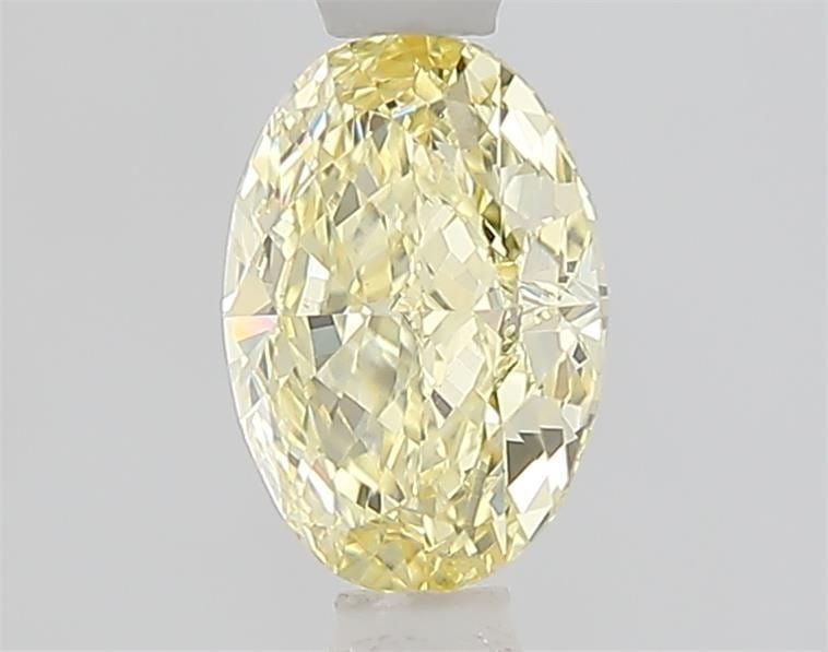 Loose Diamond - OVAL 1.01ct Fancy Light Yellow VVS1: Loose Diamond - OVAL 1.01ct Fancy Light Yellow VVS1 Source: This is a real non-mined Diamond that has been grown in a lab Shape: OVAL Carats: 1.01 Color: Fancy Light Yellow Certification: IGI Video: