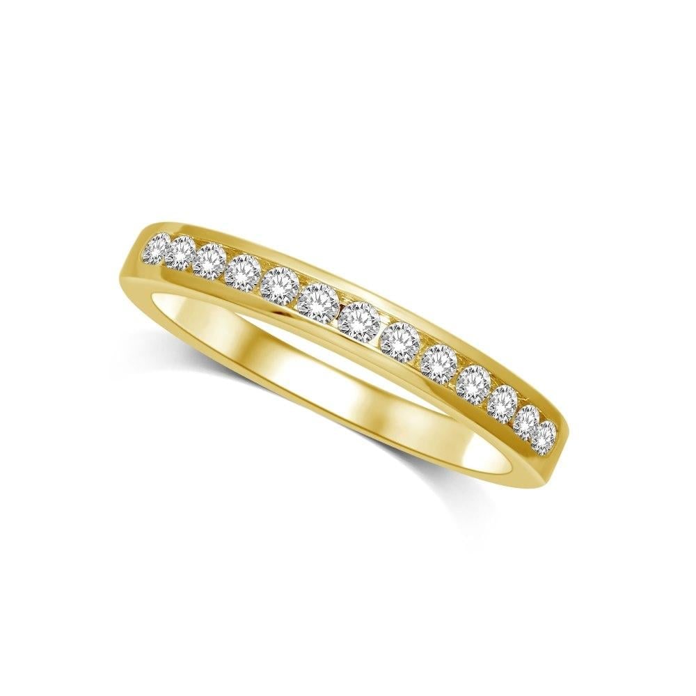 14K Yellow Gold 1/5 Ct.tw Diamond Channel Set Machine Band: 14K Yellow Gold 1/5 Ct.tw Diamond Channel Set Machine Band 14K Yellow Gold Machine Band Set with sparkling 1/5 Ct.Tw. 13 round cut diamonds in channel setting. 14k Yellow Gold Stone Color: Gh Stone Cl