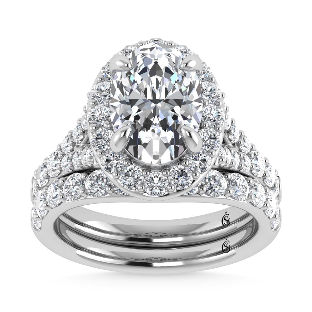 14K White Gold 4 7/8 Ct.Tw. Lab Grown Diamond Bridal Ring (IGI Certified Center 3ct): 14K White Gold 4 7/8 Ct.Tw. Lab Grown Diamond Bridal Ring (IGI Certified Center 3ct) 14k White Gold Stone Color: D-f Stone Clarity: Vs Each ring is presented in standard size 6.5. Complimentary resizi