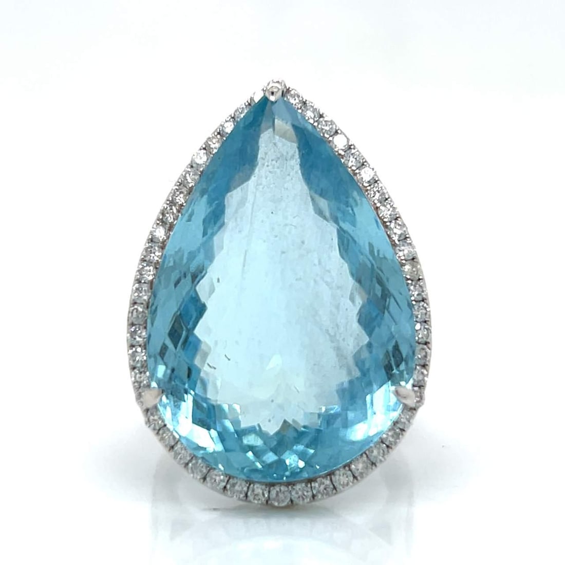 18K White Gold Aquamarine 35 Ct Diamond Ring 1.10 Ct: 18K White Gold Aquamarine 35 Ct Diamond Ring 1.10 Ct This stunning 18K white gold ring features an impressive approximately 35.00 Ct. aquamarine at its center, surrounded by 110 sparkling diamonds tha