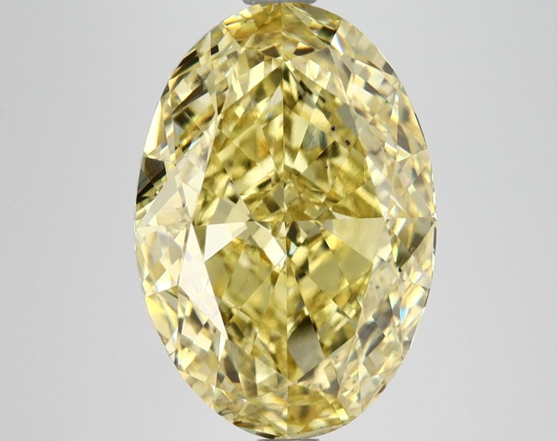 Loose Diamond - OVAL 6.17ct Fancy Vivid Yellow VS2: Loose Diamond - OVAL 6.17ct Fancy Vivid Yellow VS2 Source: This is a real non-mined Diamond that has been grown in a lab Shape: OVAL Carats: 6.17 Color: Fancy Vivid Yellow Certification: IGI Video: