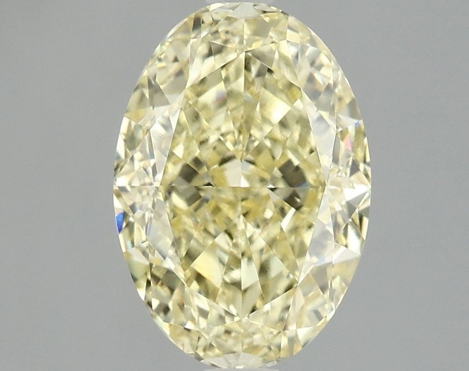 Loose Diamond - OVAL 3.05ct Fancy Vivid Yellow VS2: Loose Diamond - OVAL 3.05ct Fancy Vivid Yellow VS2 Source: This is a real non-mined Diamond that has been grown in a lab Shape: OVAL Carats: 3.05 Color: Fancy Vivid Yellow Certification: IGI Video: