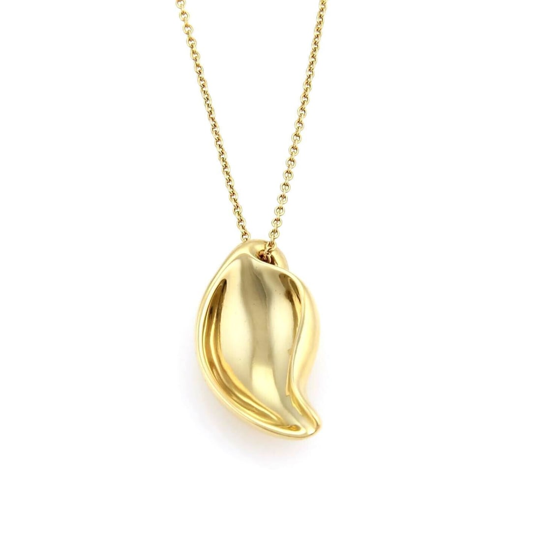 18k Gold Leaf Pendant Necklace by Tiffany & Co.: 18k Gold Leaf Pendant Necklace by Tiffany & Co. This original Tiffany & Co. necklace features a delicate leaf pendant crafted from 18k yellow gold. The chain measures 16 inches in length and 1mm in th