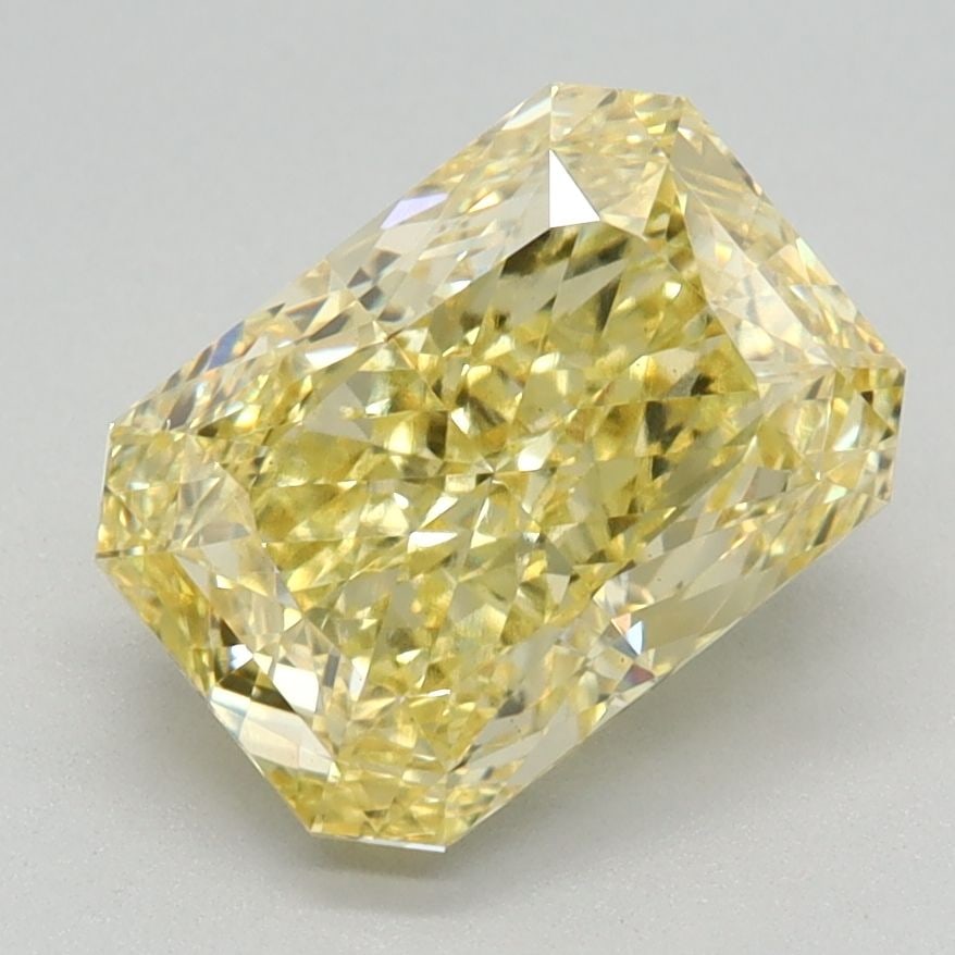 Loose Diamond - RADIANT 2.1ct Fancy Vivid Yellow VS1: Loose Diamond - RADIANT 2.1ct Fancy Vivid Yellow VS1 Source: This is a real non-mined Diamond that has been grown in a lab Shape: RADIANT Carats: 2.1 Color: Fancy Vivid Yellow Certification: IGI Video