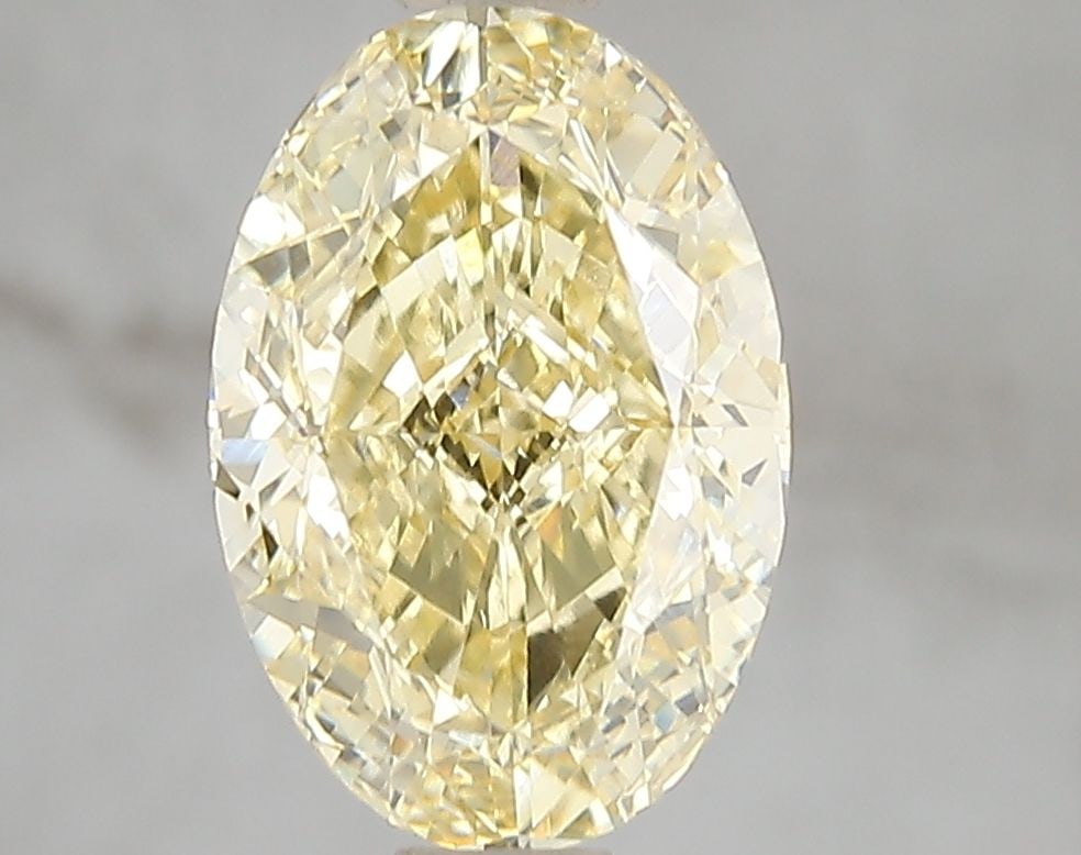 Loose Diamond - OVAL 3.01ct Fancy Intense Yellow VS1: Loose Diamond - OVAL 3.01ct Fancy Intense Yellow VS1 Source: This is a real non-mined Diamond that has been grown in a lab Shape: OVAL Carats: 3.01 Color: Fancy Intense Yellow Certification: IGI Video