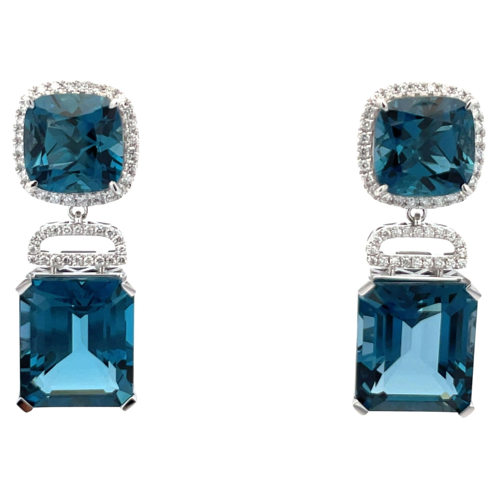 Harbor Diamonds 14K White Gold London Blue Topaz Diamond Drop Earrings 35.72 CTTW: Harbor Diamonds 14K White Gold London Blue Topaz Diamond Drop Earrings 35.72 CTTW Elevate your style with these stunning drop earrings crafted from 14 karat white gold. Featuring two cushion-cut Londo