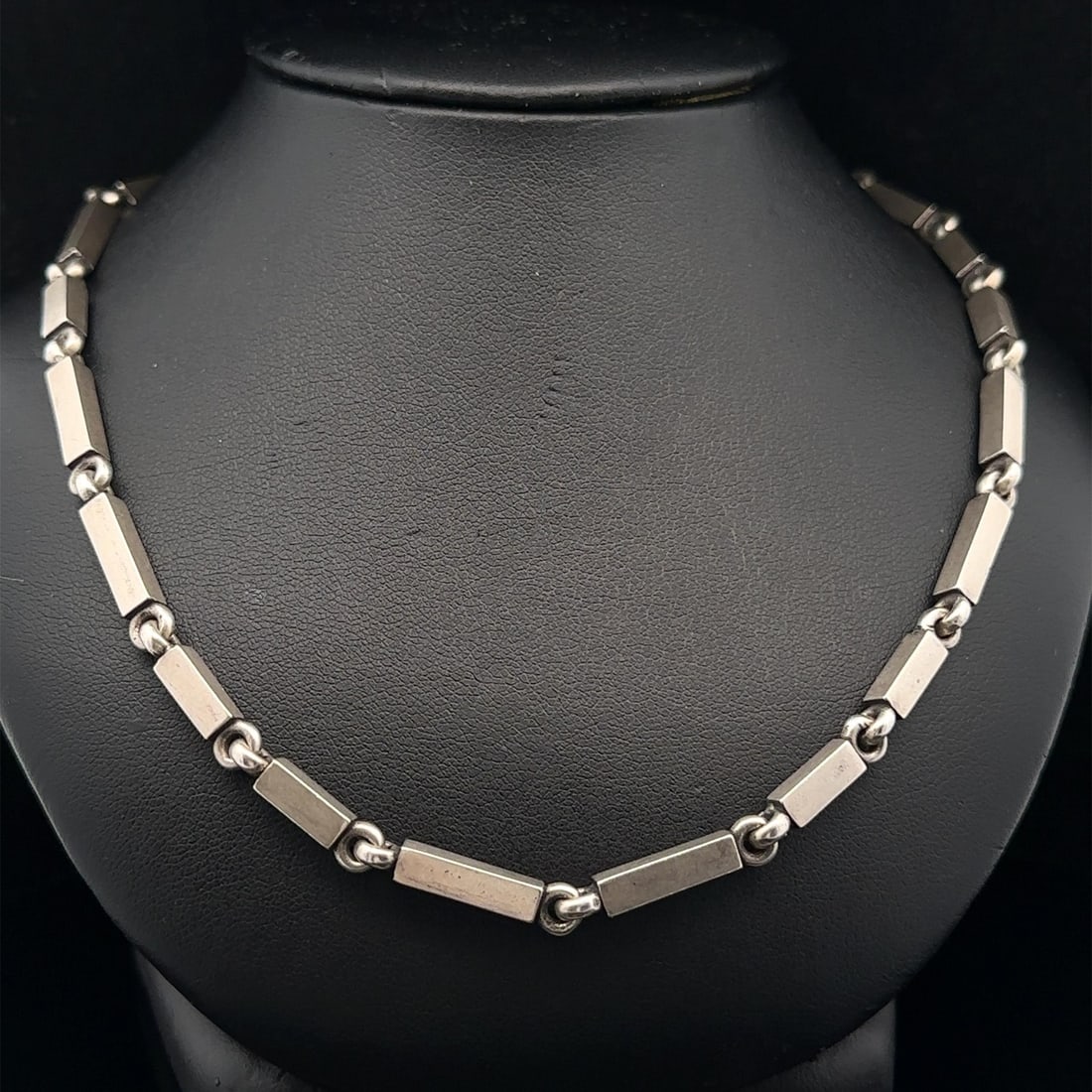 M Cohen Sterling Silver 17 Inch Box Link Chain Necklace: M Cohen Sterling Silver 17 Inch Box Link Chain Necklace Introducing the M. Cohen Sterling Silver Quadrangular Box Link Chain Necklace, a striking piece that combines elegance with modern design. Craft