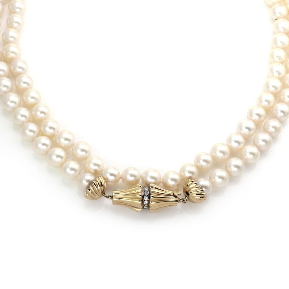 Vintage 14k Yellow Gold Pearl Necklace with Diamond Clasp 36": Vintage 14k Yellow Gold Pearl Necklace with Diamond Clasp 36" This stunning vintage necklace features a luxurious single strand of pearls, elegantly designed with a fluted clasp adorned with a round c