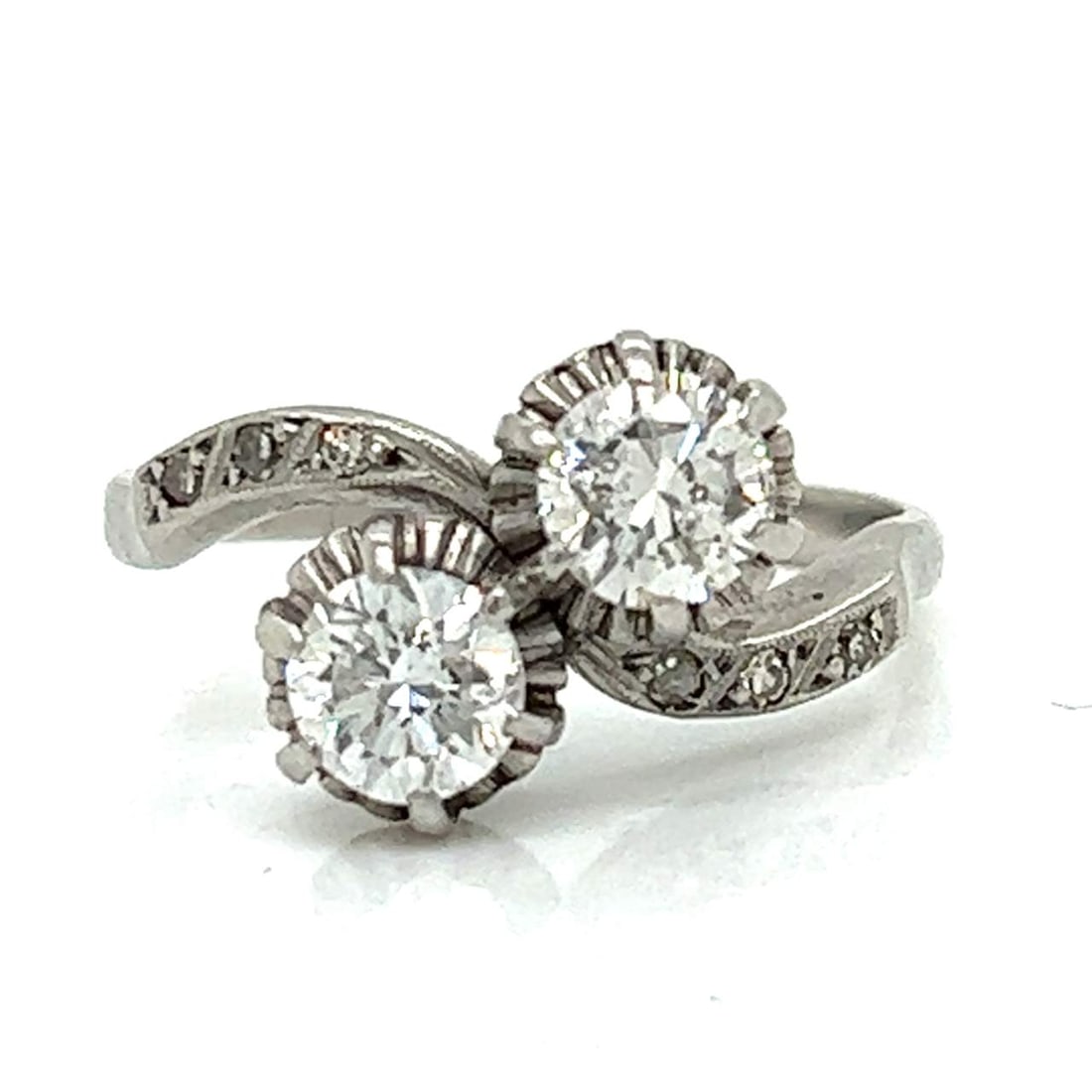 Art Deco Platinum Ring with 1.10 Ct Diamonds Size 7.5: Art Deco Platinum Ring with 1.10 Ct Diamonds Size 7.5 This exquisite Art Deco diamond ring is crafted in platinum and features two stunning diamonds that weigh approximately 1.10 Ct. The ring is a siz