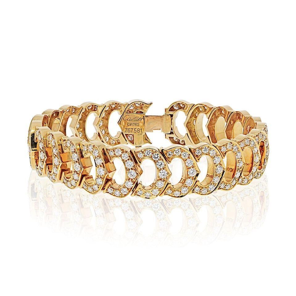 Cartier C De Cartier 18K Yellow Gold Diamond Bracelet 9.3 Cts: Cartier C De Cartier 18K Yellow Gold Diamond Bracelet 9.3 Cts This exquisite Cartier bracelet features a stunning design crafted from 18K yellow gold. The bracelet is adorned with 24 C motifs and set