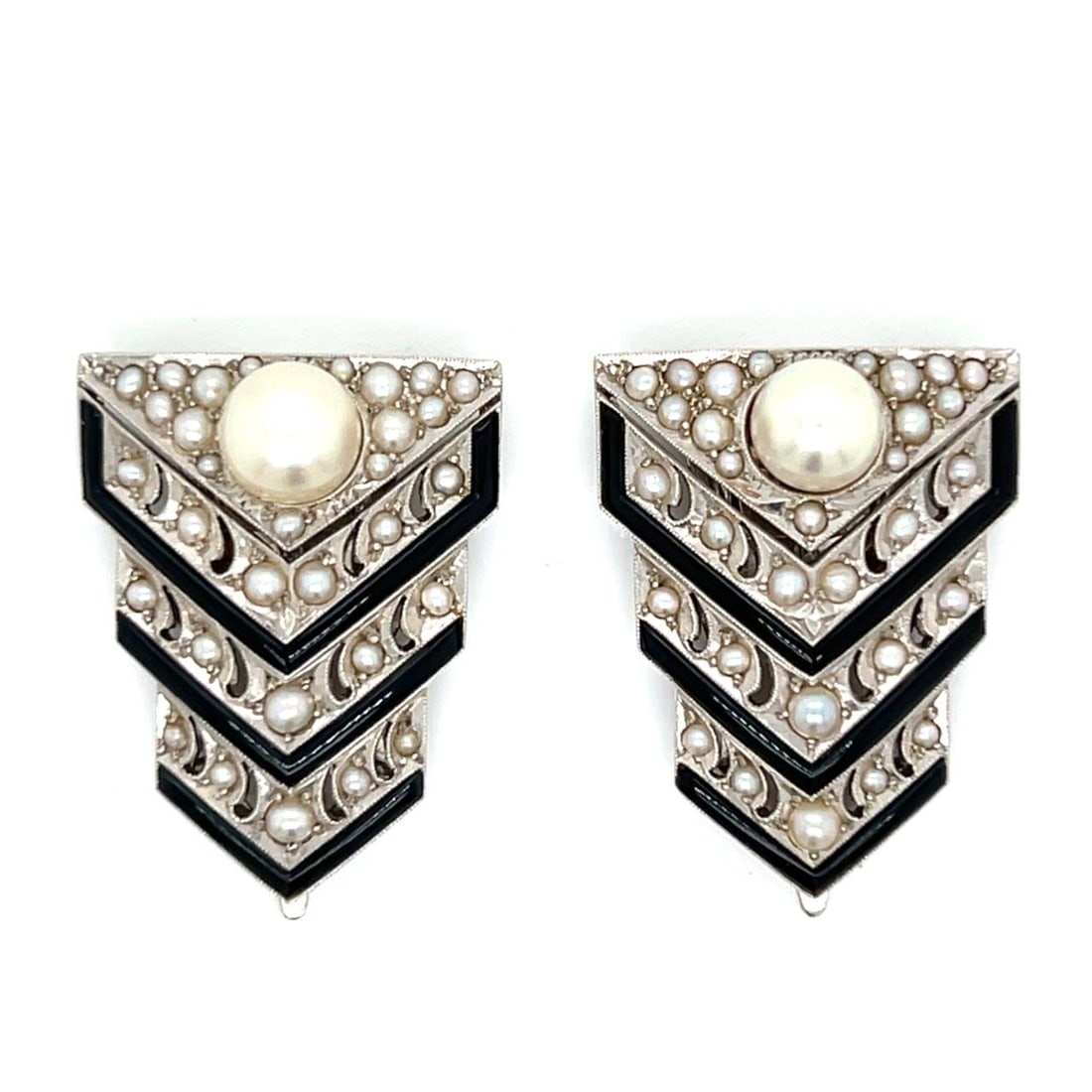 Pair of 14K Gold Art Deco Pearl Clip Earrings by Mikimoto: Pair of 14K Gold Art Deco Pearl Clip Earrings by Mikimoto This pair of MIKIMOTO Art Deco clips features pearls set in 14K gold. The clips weigh 10.9 grams and measure 1 inch in length. Condition is pr