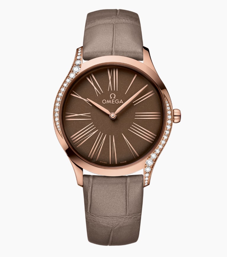 De Ville Omega Brown Dial Watch with Diamonds on Leather Ref 428.58.36.60.13.001: De Ville Omega Brown Dial Watch with Diamonds on Leather Ref 428.58.36.60.13.001 This Omega De Ville watch features a refined brown dial and a smooth bezel set with diamonds. It is paired with a leath