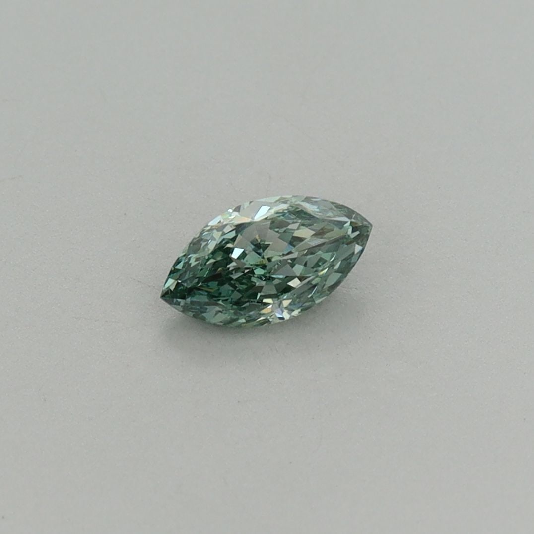 Loose Diamond - MARQUISE 0.34ct Fancy Vivid Green VS1: Loose Diamond - MARQUISE 0.34ct Fancy Vivid Green VS1 Source: This is a real non-mined Diamond that has been grown in a lab Shape: MARQUISE Carats: 0.34 Color: Fancy Vivid Green Certification: IGI Vid