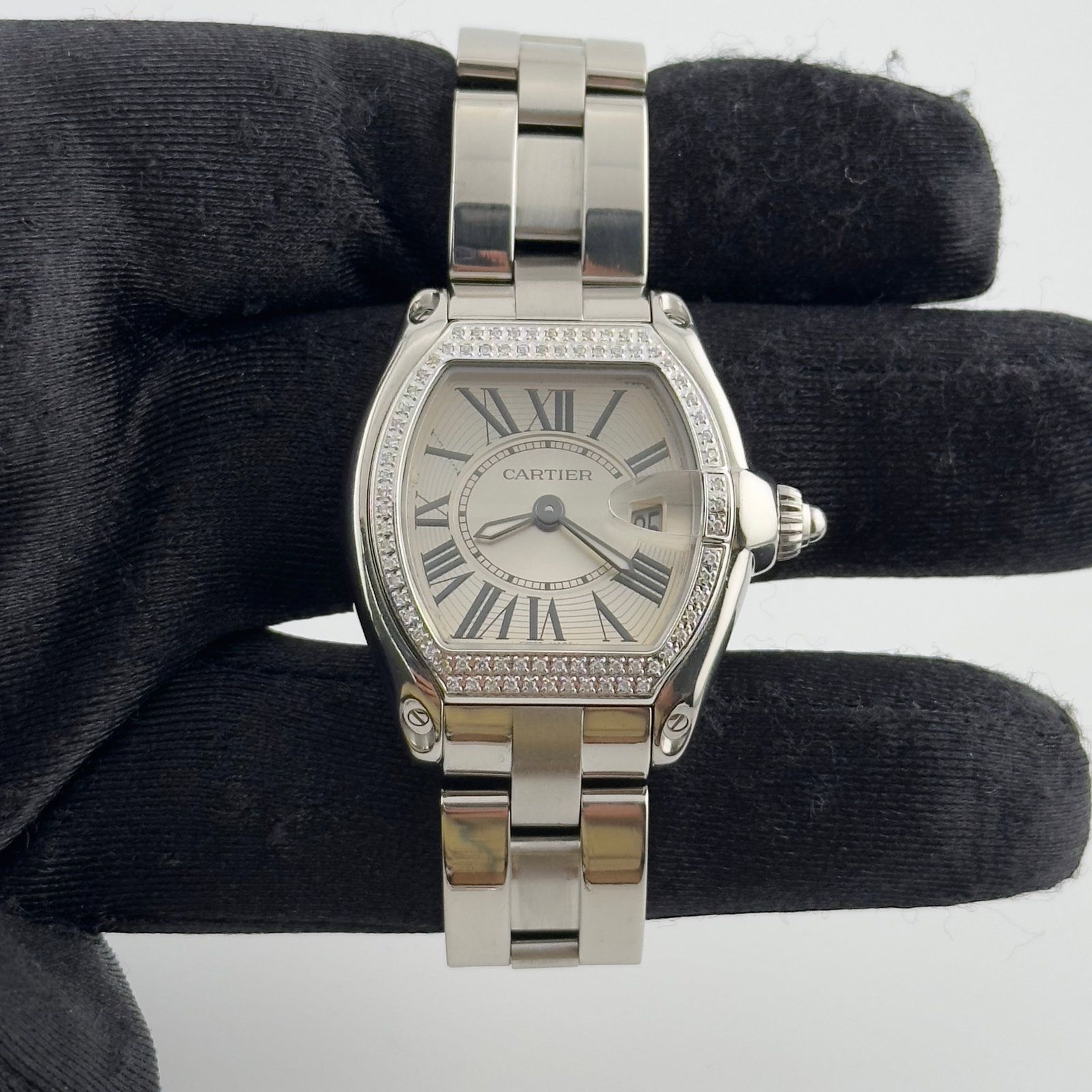 Cartier Roadster Reference 2675 Stainless Steel Watch with Roman Numeral Dial: Cartier Roadster Reference 2675 Stainless Steel Watch with Roman Numeral Dial Cartier Roadster watch featuring a silver Roman dial and reference number 2675. Crafted in stainless steel, this timepiece