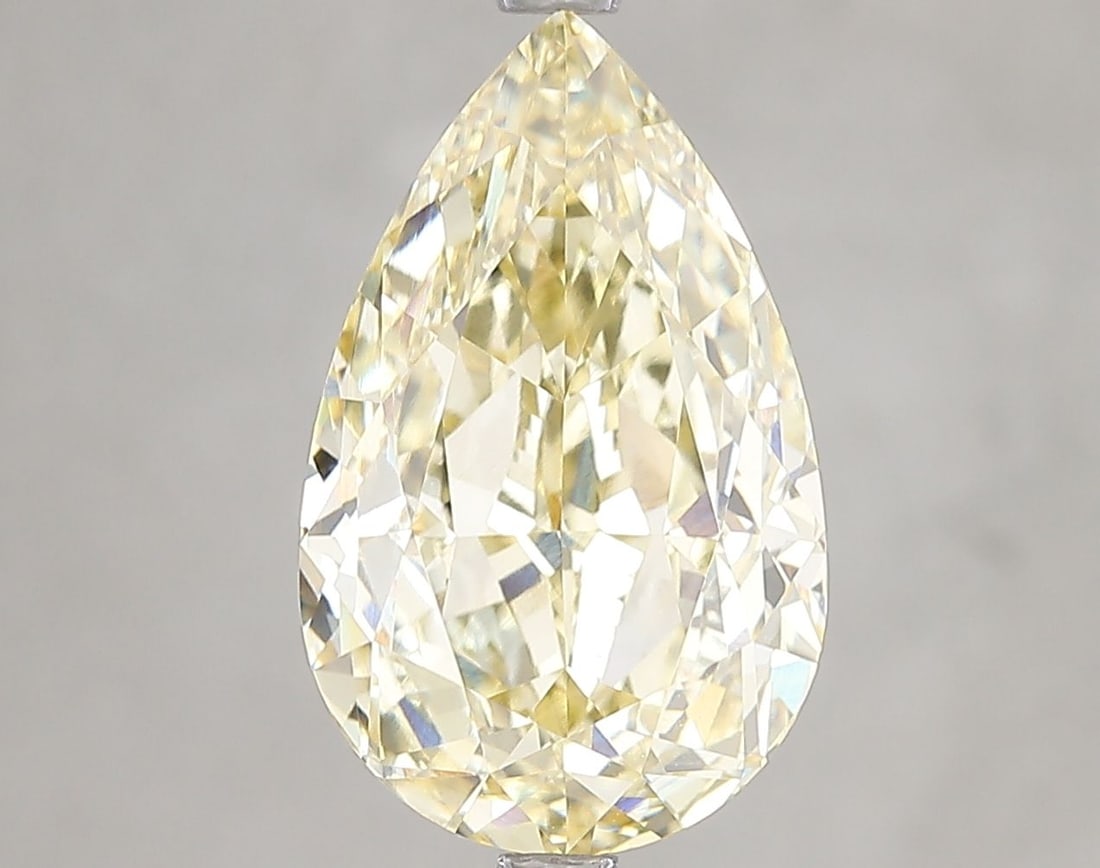 Loose Diamond - PEAR 5.13ct Fancy Vivid Yellow VVS2: Loose Diamond - PEAR 5.13ct Fancy Vivid Yellow VVS2 Source: This is a real non-mined Diamond that has been grown in a lab Shape: PEAR Carats: 5.13 Color: Fancy Vivid Yellow Certification: IGI Video: