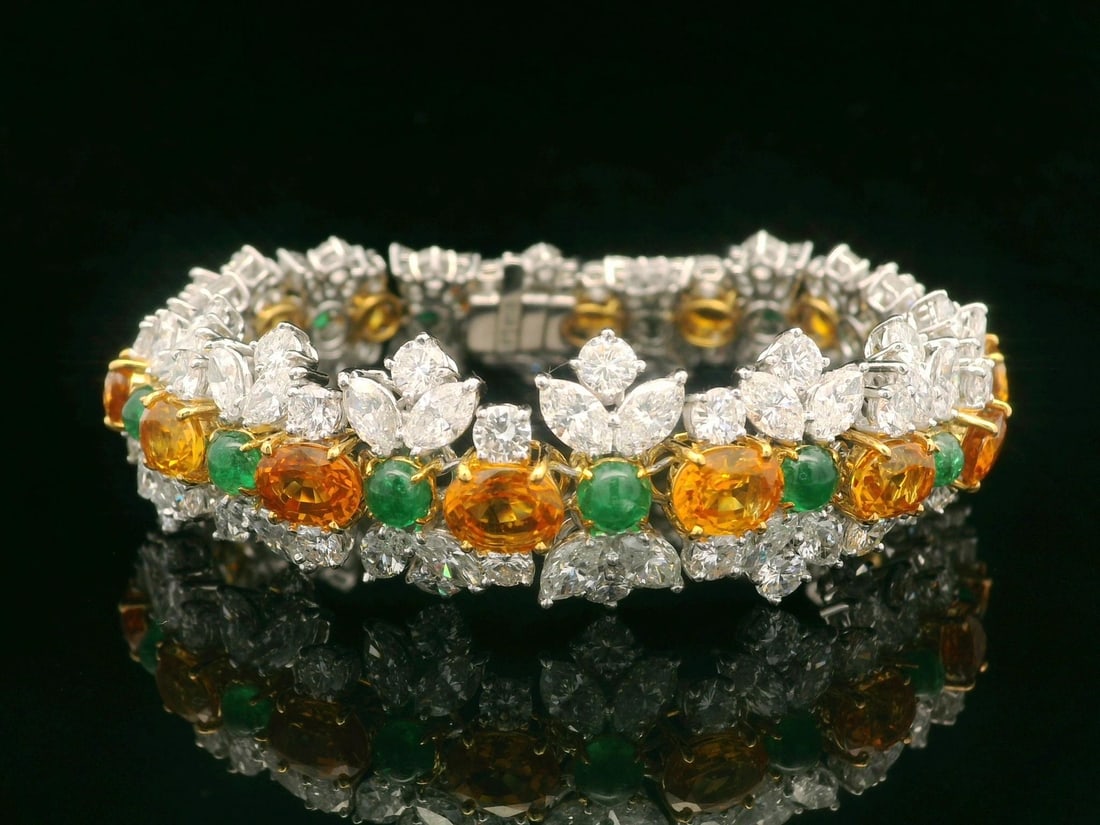 GIA Certified 37.84ct Sapphire Emerald Diamond Bracelet in Platinum Gold: GIA Certified 37.84ct Sapphire Emerald Diamond Bracelet in Platinum Gold This exquisite bracelet is a stunning statement piece featuring an elegant combination of platinum and 18k yellow gold. It show