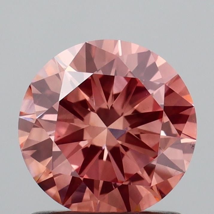 Loose Diamond - ROUND 1.03ct Fancy Pinkish Brown VS1: Loose Diamond - ROUND 1.03ct Fancy Pinkish Brown VS1 Source: This is a real non-mined Diamond that has been grown in a lab Shape: ROUND Carats: 1.03 Color: Fancy Pinkish Brown Certification: IGI Video