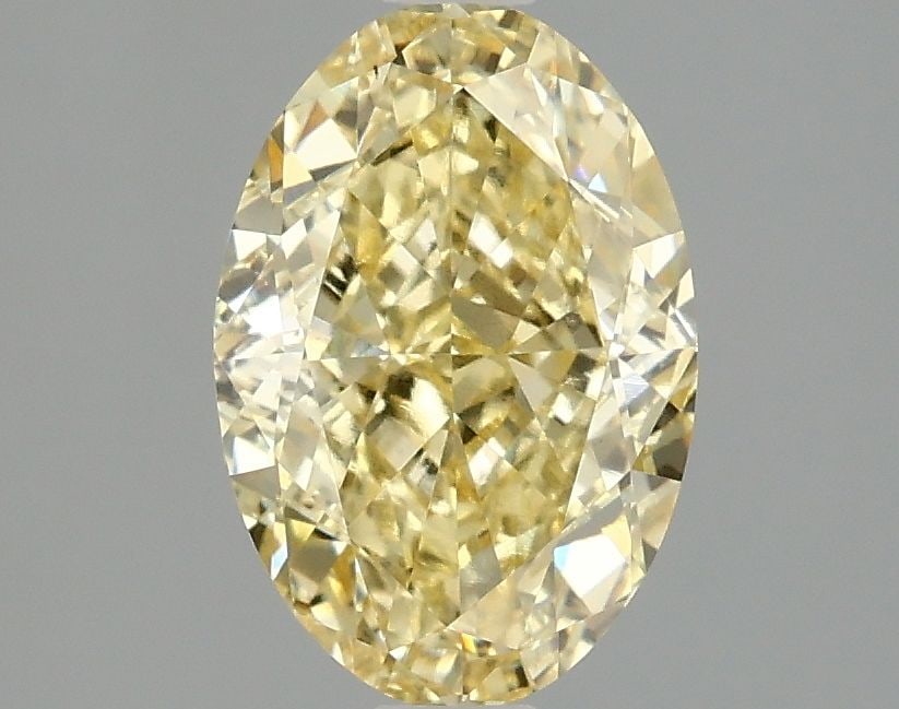Loose Diamond - OVAL 2.09ct Fancy Intense Yellow VS1: Loose Diamond - OVAL 2.09ct Fancy Intense Yellow VS1 Source: This is a real non-mined Diamond that has been grown in a lab Shape: OVAL Carats: 2.09 Color: Fancy Intense Yellow Certification: IGI Video