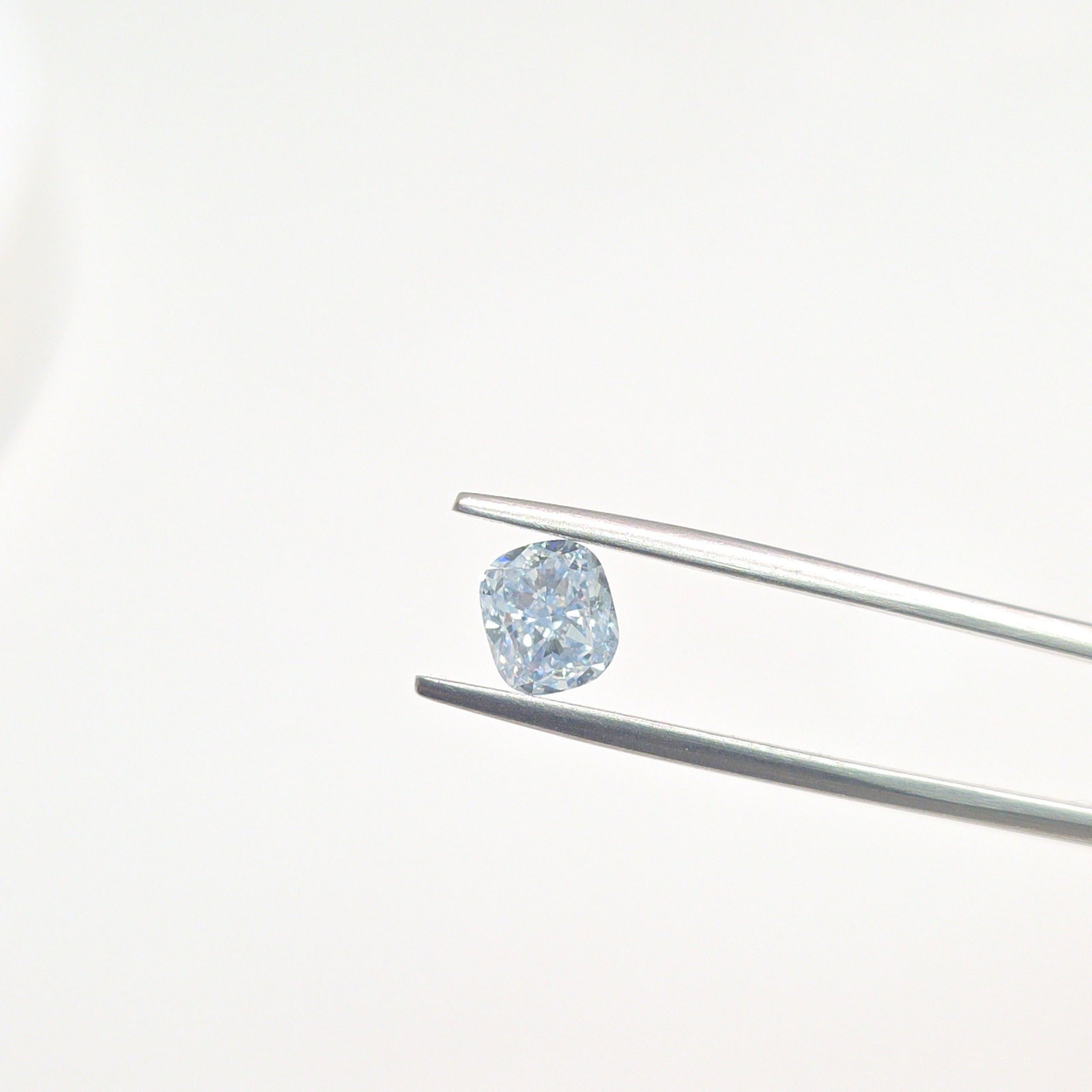 Loose Diamond - CUSHION MODIFIED 1.12ct Fancy Light Blue VS1: Loose Diamond - CUSHION MODIFIED 1.12ct Fancy Light Blue VS1 Source: This is a real non-mined Diamond that has been grown in a lab Shape: CUSHION MODIFIED Carats: 1.12 Color: Fancy Light Blue Certific