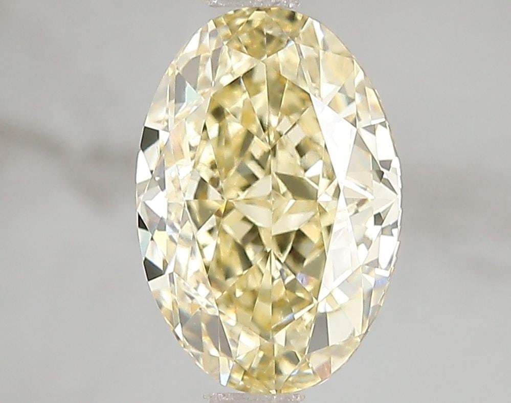 Loose Diamond - OVAL 3.02ct Fancy Intense Yellow VS1: Loose Diamond - OVAL 3.02ct Fancy Intense Yellow VS1 Source: This is a real non-mined Diamond that has been grown in a lab Shape: OVAL Carats: 3.02 Color: Fancy Intense Yellow Certification: IGI Video