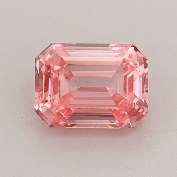 Loose Diamond - EMERALD 0.73ct Fancy Vivid Pink VS2: Loose Diamond - EMERALD 0.73ct Fancy Vivid Pink VS2 Source: This is a real non-mined Diamond that has been grown in a lab Shape: EMERALD Carats: 0.73 Color: Fancy Vivid Pink Certification: IGI Video: