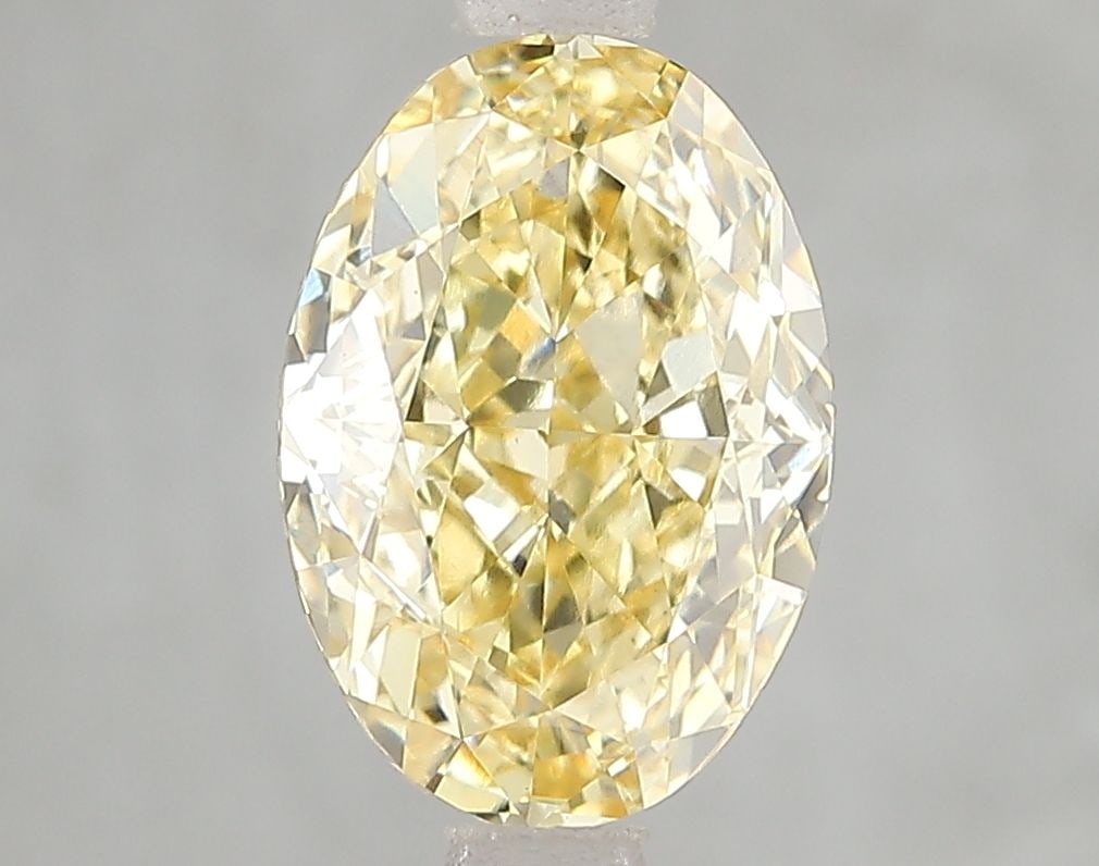 Loose Diamond - OVAL 3.03ct Fancy Intense Yellow VVS2: Loose Diamond - OVAL 3.03ct Fancy Intense Yellow VVS2 Source: This is a real non-mined Diamond that has been grown in a lab Shape: OVAL Carats: 3.03 Color: Fancy Intense Yellow Certification: IGI Vide