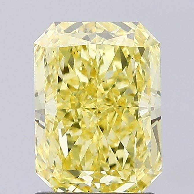 Loose Diamond - RADIANT 1.6ct Fancy Vivid Yellow VS1: Loose Diamond - RADIANT 1.6ct Fancy Vivid Yellow VS1 Source: This is a real non-mined Diamond that has been grown in a lab Shape: RADIANT Carats: 1.6 Color: Fancy Vivid Yellow Certification: IGI Video