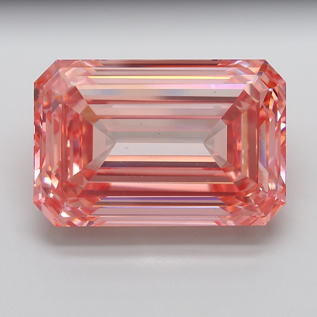 Loose Diamond - EMERALD 31.63ct Fancy Vivid Pink VS1: Loose Diamond - EMERALD 31.63ct Fancy Vivid Pink VS1 Source: This is a real non-mined Diamond that has been grown in a lab Shape: EMERALD Carats: 31.63 Color: Fancy Vivid Pink Certification: IGI