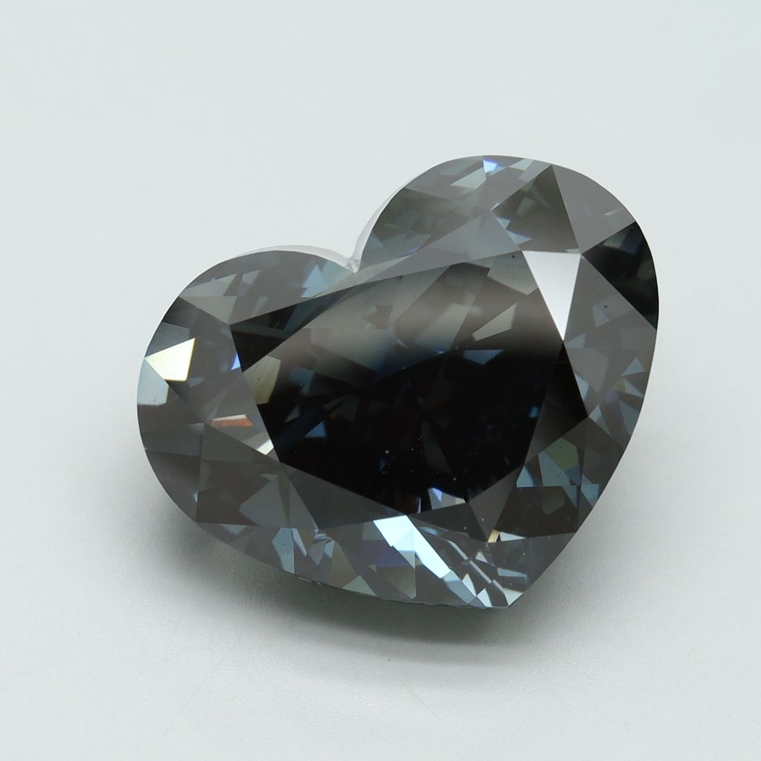 Loose Diamond - HEART 14.25ct Fancy Deep Gray Blue VS2: Loose Diamond - HEART 14.25ct Fancy Deep Gray Blue VS2 Source: This is a real non-mined Diamond that has been grown in a lab Shape: HEART Carats: 14.25 Color: Fancy Deep Gray Blue Certification: IGI V