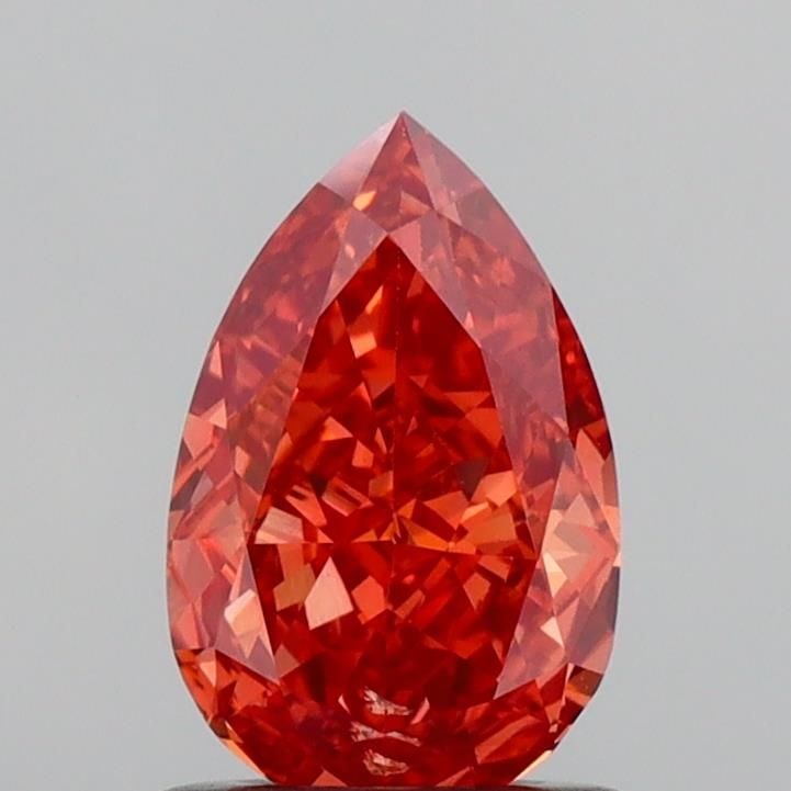 Loose Diamond - PEAR 1.02ct Fancy Vivid Orange VS2: Loose Diamond - PEAR 1.02ct Fancy Vivid Orange VS2 Source: This is a real non-mined Diamond that has been grown in a lab Shape: PEAR Carats: 1.02 Color: Fancy Vivid Orange Certification: IGI Video:
