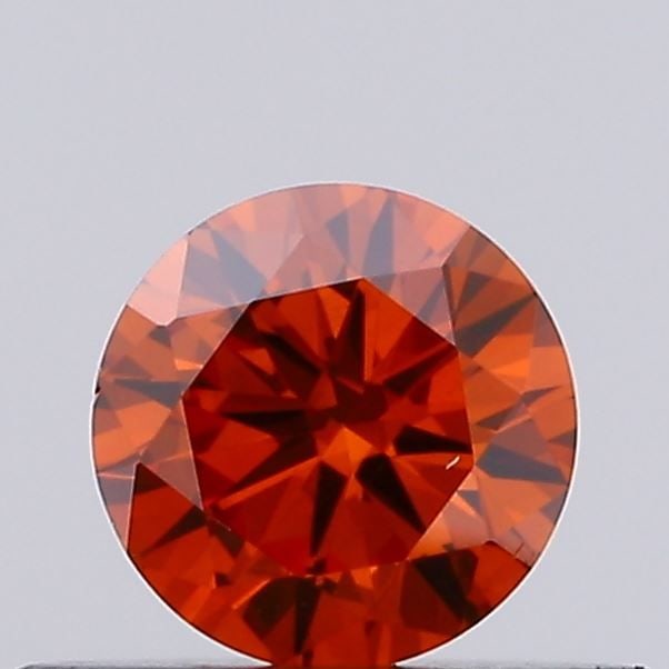 Loose Diamond - ROUND 0.26ct Fancy Vivid Orange VS2: Loose Diamond - ROUND 0.26ct Fancy Vivid Orange VS2 Source: This is a real non-mined Diamond that has been grown in a lab Shape: ROUND Carats: 0.26 Color: Fancy Vivid Orange Certification: IGI Video: