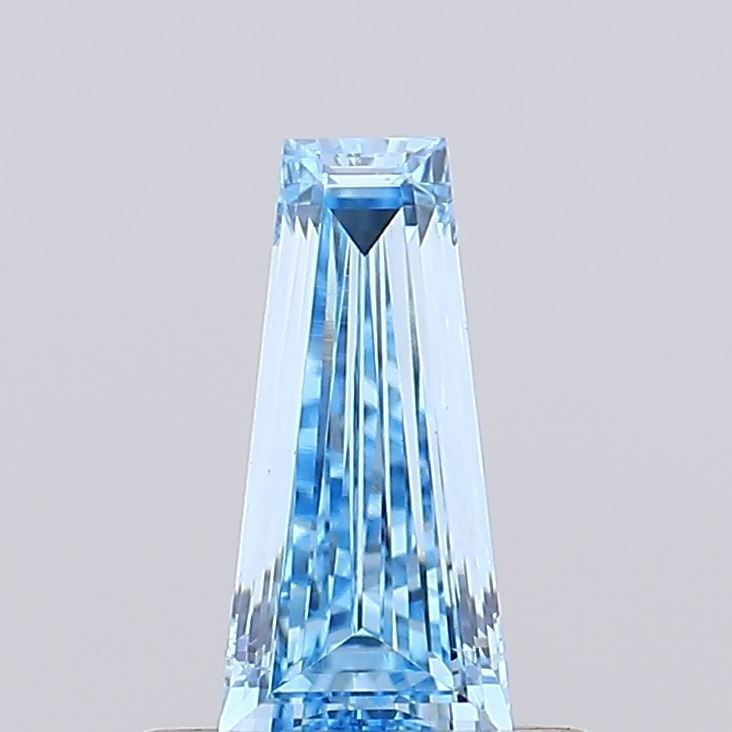 Loose Diamond - TAPERED BAGUETTE 0.23ct Fancy Vivid Blue VS1: Loose Diamond - TAPERED BAGUETTE 0.23ct Fancy Vivid Blue VS1 Source: This is a real non-mined Diamond that has been grown in a lab Shape: TAPERED BAGUETTE Carats: 0.23 Color: Fancy Vivid Blue Certific
