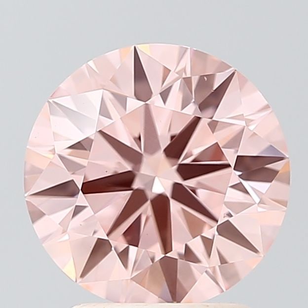 Ideal Loose Diamond - ROUND 2.03ct Fancy Vivid Pink VVS2: Ideal Loose Diamond - ROUND 2.03ct Fancy Vivid Pink VVS2 Source: This is a real non-mined Diamond that has been grown in a lab Shape: ROUND Carats: 2.03 Color: Fancy Vivid Pink Certification: IGI Vide