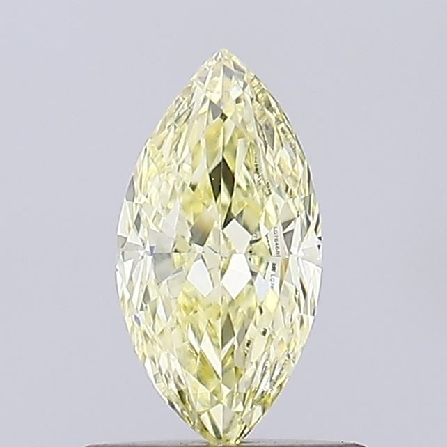 Loose Diamond - MARQUISE 0.58ct Fancy Yellow VVS2: Loose Diamond - MARQUISE 0.58ct Fancy Yellow VVS2 Source: This is a real non-mined Diamond that has been grown in a lab Shape: MARQUISE Carats: 0.58 Color: Fancy Yellow Certification: IGI Video: