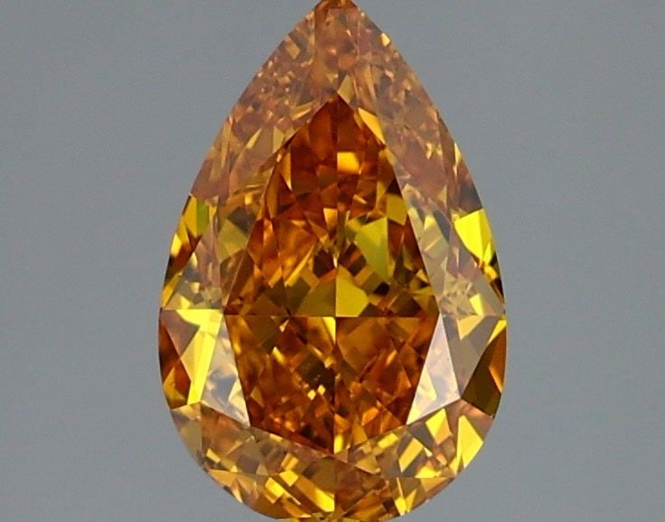 Loose Diamond - PEAR 2.02ct Fancy Vivid Orangey Yellow VVS1: Loose Diamond - PEAR 2.02ct Fancy Vivid Orangey Yellow VVS1 Source: This is a real non-mined Diamond that has been grown in a lab Shape: PEAR Carats: 2.02 Color: Fancy Vivid Orangey Yellow Certificati