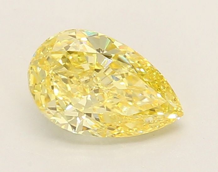 Loose Diamond - PEAR 0.91ct Fancy Intense Yellow VS1: Loose Diamond - PEAR 0.91ct Fancy Intense Yellow VS1 Source: This is a real non-mined Diamond that has been grown in a lab Shape: PEAR Carats: 0.91 Color: Fancy Intense Yellow Certification: IGI Video