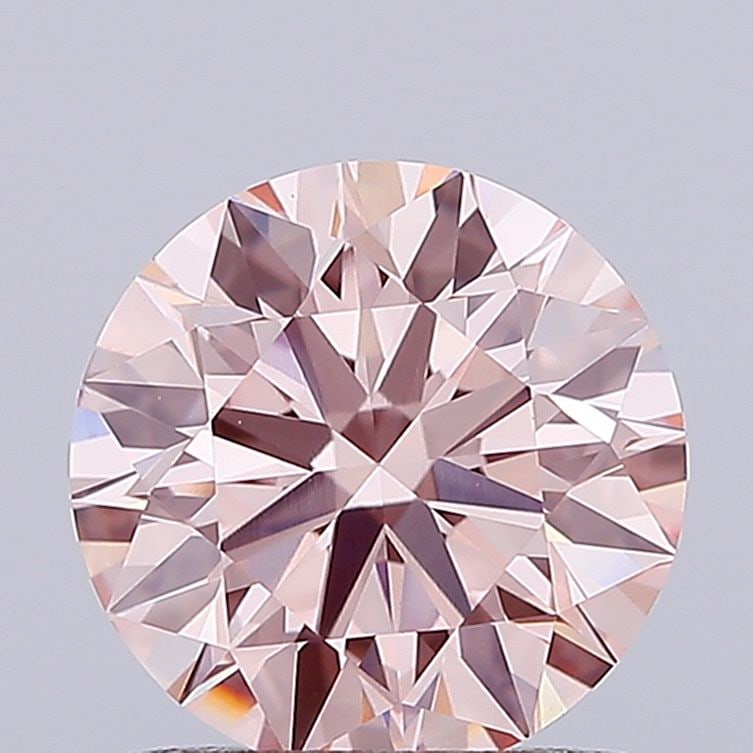 Ideal Loose Diamond - ROUND 1.42ct Fancy Pink VS1: Ideal Loose Diamond - ROUND 1.42ct Fancy Pink VS1 Source: This is a real non-mined Diamond that has been grown in a lab Shape: ROUND Carats: 1.42 Color: Fancy Pink Certification: IGI Video: Video