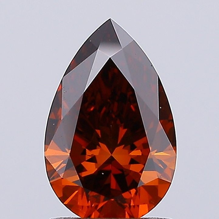 Loose Diamond - PEAR 1.52ct Fancy Deep Orange VS1: Loose Diamond - PEAR 1.52ct Fancy Deep Orange VS1 Source: This is a real non-mined Diamond that has been grown in a lab Shape: PEAR Carats: 1.52 Color: Fancy Deep Orange Certification: IGI Video:
