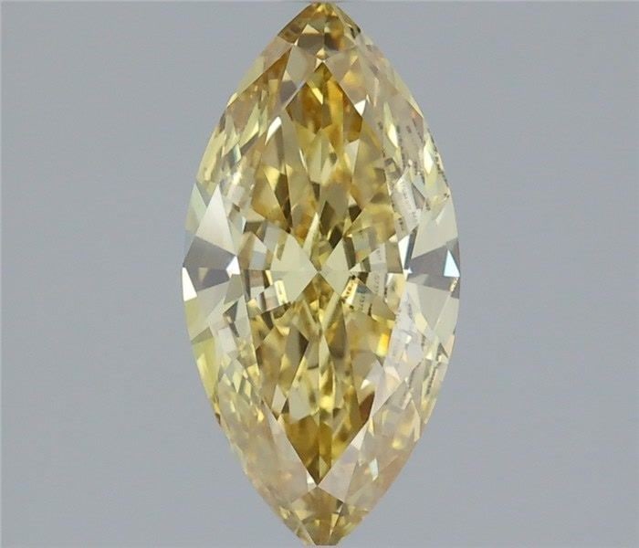 Loose Diamond - MARQUISE 1.12ct Fancy Vivid Yellow VVS2: Loose Diamond - MARQUISE 1.12ct Fancy Vivid Yellow VVS2 Source: This is a real non-mined Diamond that has been grown in a lab Shape: MARQUISE Carats: 1.12 Color: Fancy Vivid Yellow Certification: IGI