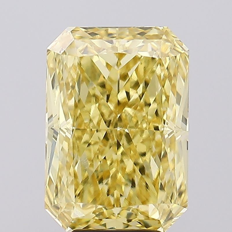 Loose Diamond - RADIANT 6.58ct Fancy Vivid Yellow VVS2: Loose Diamond - RADIANT 6.58ct Fancy Vivid Yellow VVS2 Source: This is a real non-mined Diamond that has been grown in a lab Shape: RADIANT Carats: 6.58 Color: Fancy Vivid Yellow Certification: IGI Vi