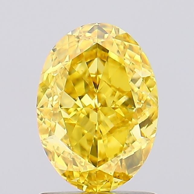 Loose Diamond - OVAL 1.6ct Fancy Vivid Yellow VS1: Loose Diamond - OVAL 1.6ct Fancy Vivid Yellow VS1 Source: This is a real non-mined Diamond that has been grown in a lab Shape: OVAL Carats: 1.6 Color: Fancy Vivid Yellow Certification: IGI Video: