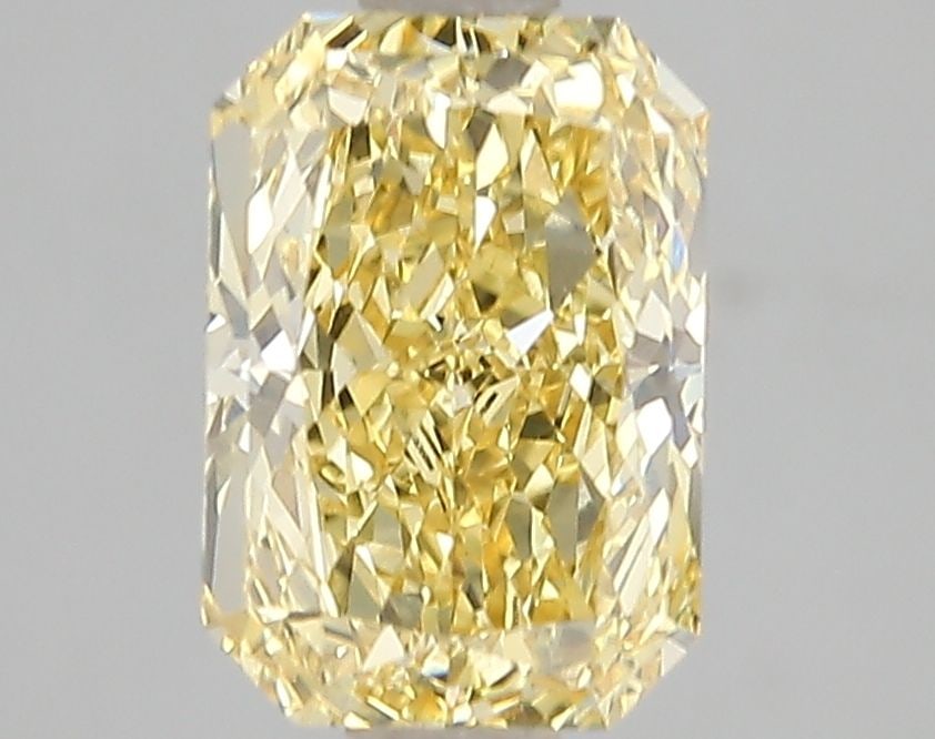 Loose Diamond - RADIANT 2.1ct Fancy Vivid Yellow VS1: Loose Diamond - RADIANT 2.1ct Fancy Vivid Yellow VS1 Source: This is a real non-mined Diamond that has been grown in a lab Shape: RADIANT Carats: 2.1 Color: Fancy Vivid Yellow Certification: IGI Video