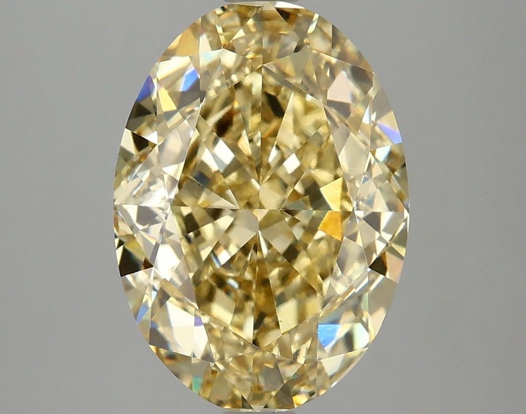 Loose Diamond - OVAL 5.03ct Fancy Vivid Yellow VS1: Loose Diamond - OVAL 5.03ct Fancy Vivid Yellow VS1 Source: This is a real non-mined Diamond that has been grown in a lab Shape: OVAL Carats: 5.03 Color: Fancy Vivid Yellow Certification: IGI Video: