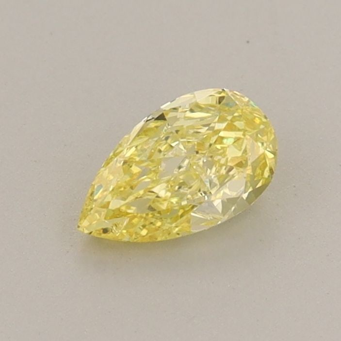 Loose Diamond - PEAR 0.38ct Fancy Vivid Yellow SI1: Loose Diamond - PEAR 0.38ct Fancy Vivid Yellow SI1 Source: This is a real non-mined Diamond that has been grown in a lab Shape: PEAR Carats: 0.38 Color: Fancy Vivid Yellow Certification: IGI Video: